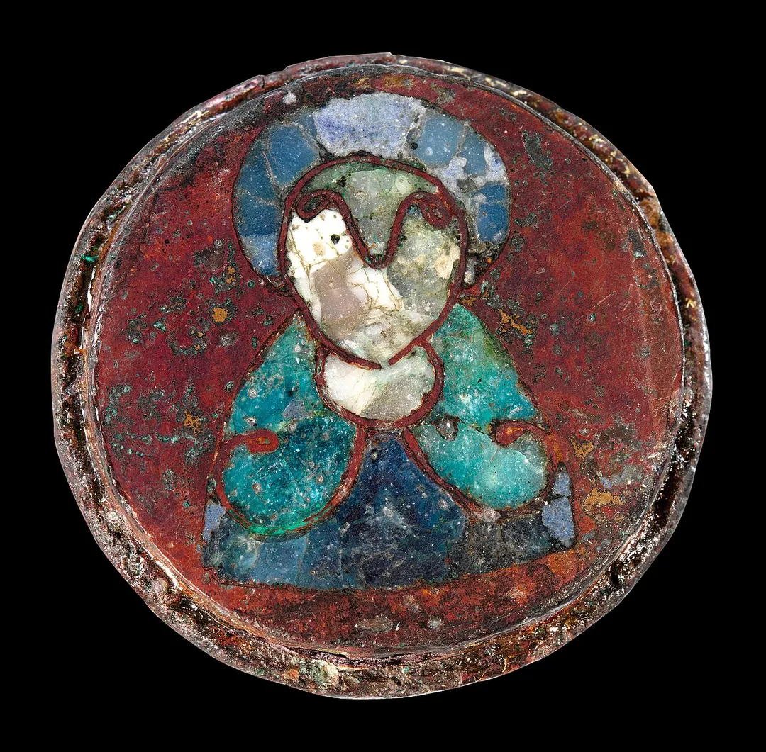 Maschen disc brooch depicting probably an unidentified saint found in a woman's grave.