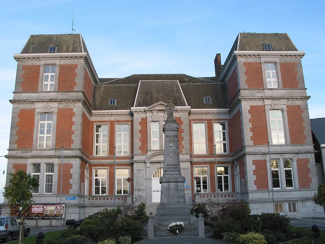 Momignies (Belgium), the town hall and the memorial to victims of the First World War.