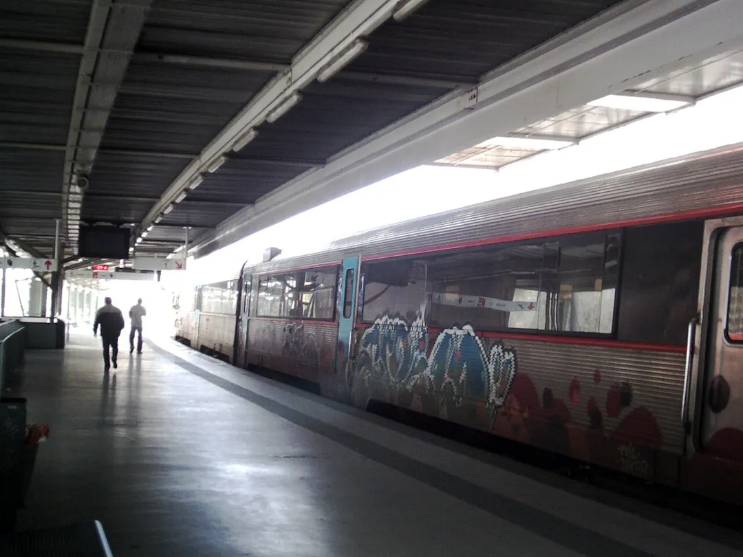Train station of Queluz-Belas Sete Rios in the Sintra Cintura railroad. Regional train on the right.
