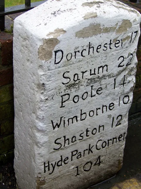 Milestone, Blandford Forum Milestone set beside the wall of the Crown Hotel on West Street.