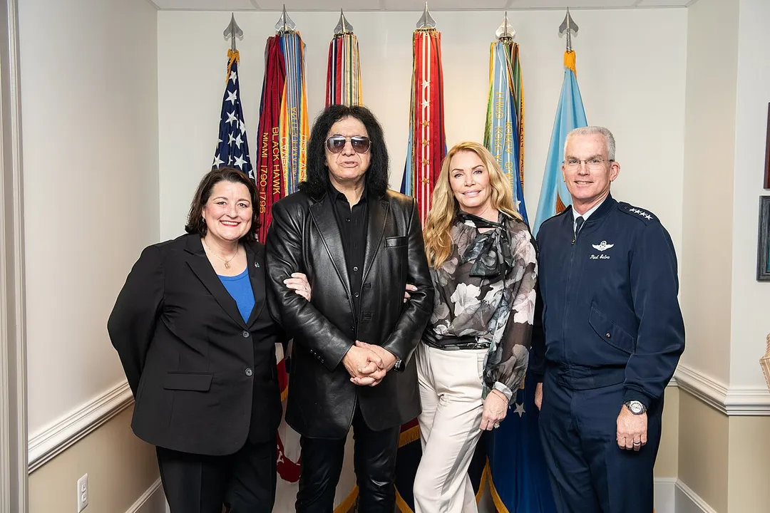 Gene Simmons, bassist and co-lead singer of the rock band KISS; and his wife Shannon Tweed-Simmons, visit the Pentagon meeting with members of the Joint Staff including Air Force Gen. Paul J. Selva, vice chairman of the Joint Chiefs of Staff, and Army Command Sgt. Maj. John W. Troxell, Senior Enlisted Advisor to the chairman of the Joint Chiefs of Staff, May 16, 2019. (DoD Photo by U.S. Army Sgt. James K. McCann)