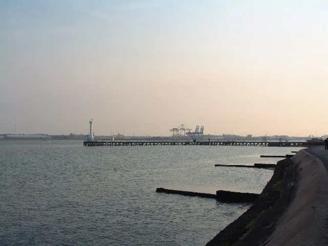 Shotley Gate. Disused pier at Shotley Gate with Harwich International Port in the distance