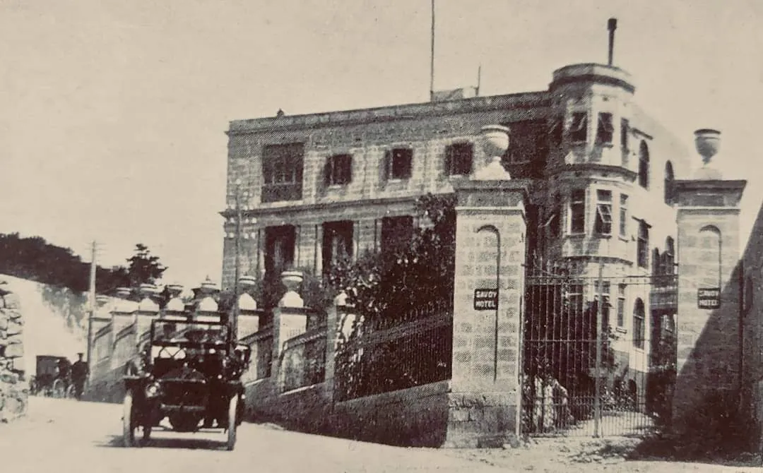 Hotel Savoy, Sliema circa 1915

"My family recently came into possession of this vintage photograph. The Savoy Hotel at the top of Rue d'Argens, photographed by Richard Ellis, British-Maltese photographer who was one of the pioneers of photography in Malta during the late 19th and early 20th centuries. 
The Studebaker-Garford 1904-11 model automobile in the frame has the Savoy Hotel chauffeur driving the hotel’s proprietor, Joseph Galea and his wife Annetta (my grand-parents). My grandfather, Joseph Galea (1874-1955), owned several of these vehicles. 
In its heyday, the Savoy was a prominent hotel, managed by my grandfather from 1904-48. It boasted magnificent views of the Sliema promenade. 
My father, Henry Galea LRSM (London), who was born and raised at the Savoy said that on a clear day you could see the outline of Sicily, some 60 miles north of Malta.
Photo courtesy of Michael Sammut, and my brother Edwin Galea. 

It’s highly likely that this photo was taken during World War I." - Ray Galéa [1]