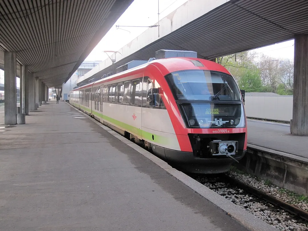 These modern Desiro EMUs built by Siemens are the new look to many European railways. Bulgaria has joined in by ordering many sets to replace older EMUs and hauled trains on local and regional services. Seen at  Sofia, 31005 adds a little colour to the rather sparse looking station on a rather hazy morning on 21 April 2010.