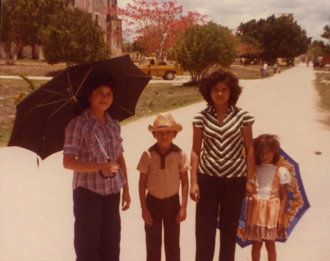 4 youths in main square, Sotuta, Yucatán