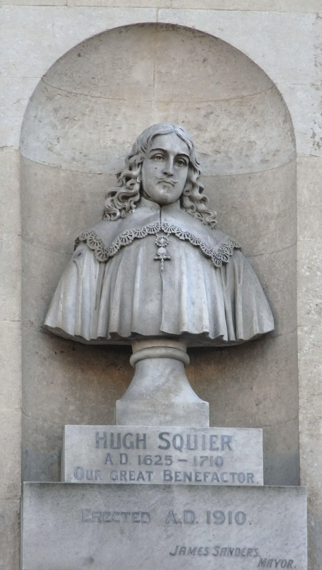 Stone bust of Hugh Squier (1625-1710), facade of South Molton Town Hall. Inscribed on plinths: "Hugh Squier AD 1625-1710. Our great benefactor. Erected AD 1910, James Sanders, Mayor"
