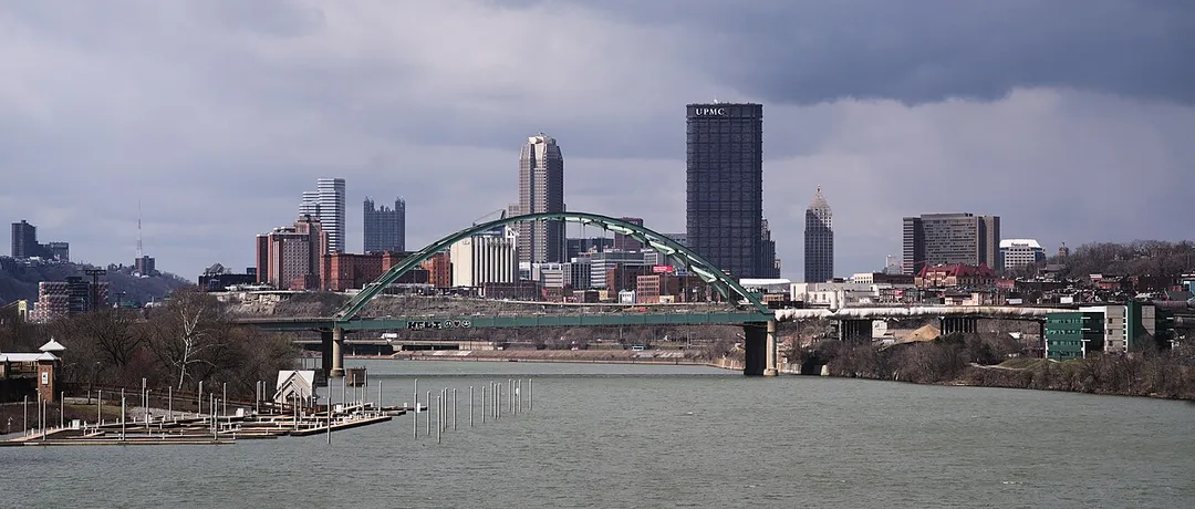 The skyline of Pittsburgh as seen from Hot Metal Bridge. The nearest visible bridge is the Birmingham Bridge.