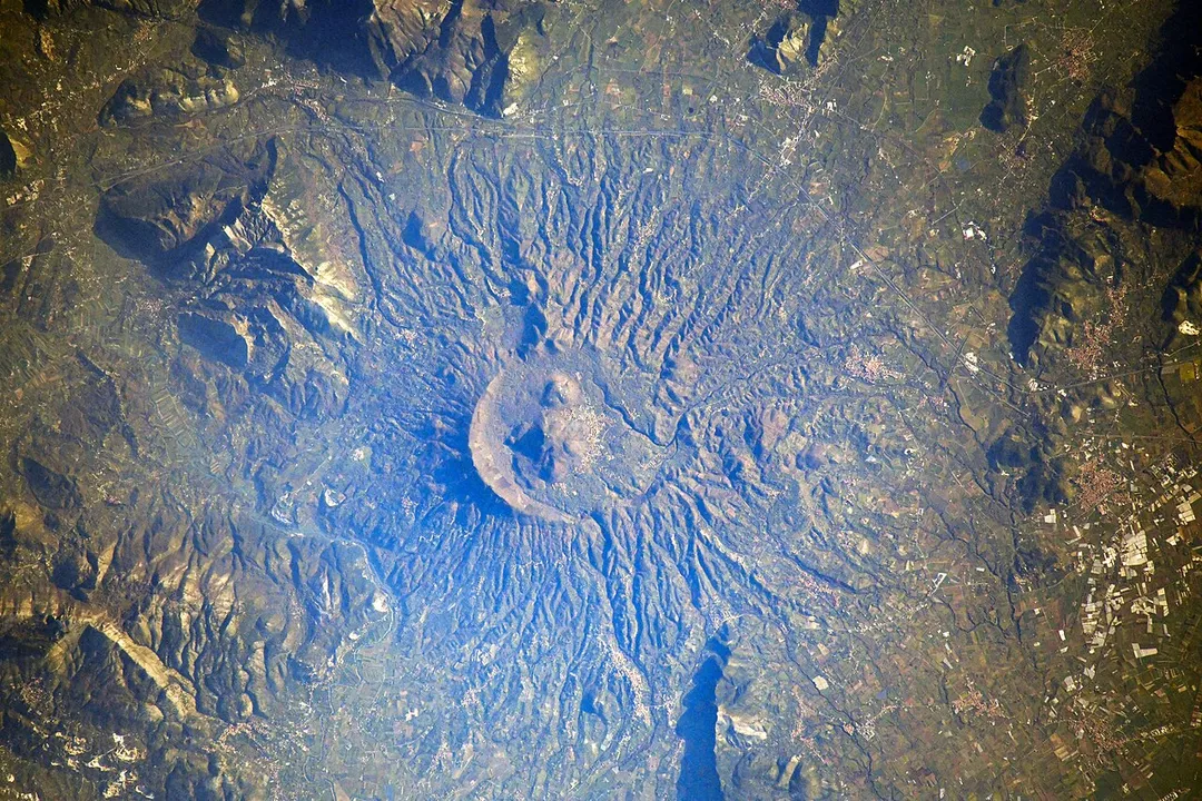 View of Italy taken during ISS Expedition 64. Roccamonfina volcanic mountain region, villages Teano, Sparanise.