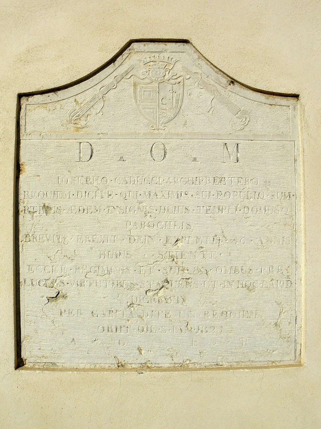 Stienta, provincia di Rovigo: lapide commemorativa sita sulla facciata della parrocchiale di Santo Stefano, papa e martire.