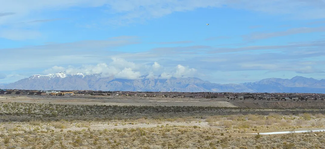 Summerlin in southern Nevada — seen from the entrance to the Red Rock Canyon National Conservation Area. 
Summerlin is a new master-planned community partially in the city of Las Vegas and partially in an unincorporated area of Clark County (as of 2013).