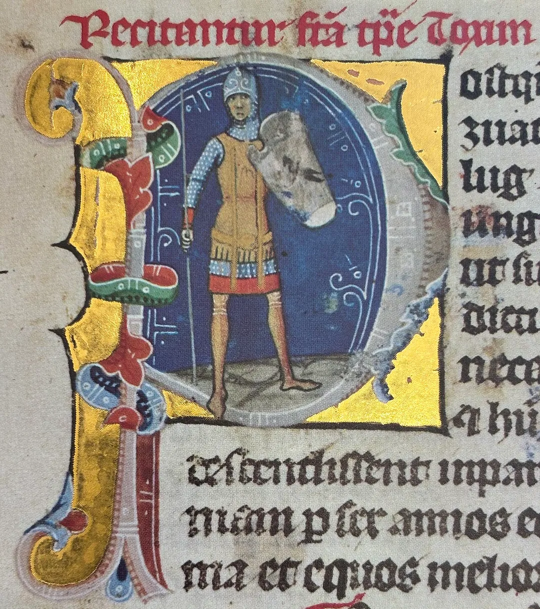 Illuminated Chronicle (Page 33) - Grand Prince TaksonyTaksony, Grand Prince of the Hungarians, bears a blurred shield displaying a black Turul bird and holds a spear in his hand.
