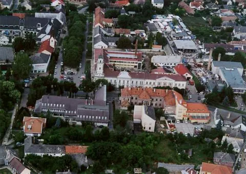 Towered building is the Town hall. Right of the Town hall is the market. - Kossuth square and around, Tamási, Tolna County, Hungary, aerialphotography