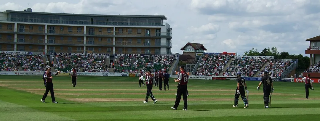 A view across the County Ground Taunton, looking towards the Somerset stand and the Marcus Trescothick stand.  Somerset are playing Yorkshire in a Pro40 match, with the two sides walking out for Yorkshire's innings.  The Yorkshire batsmen are Andrew Gale and Jacques Rudolph