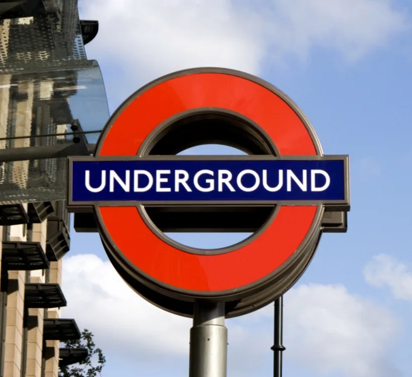 Photograph of the underground sign at Westminster underground station.