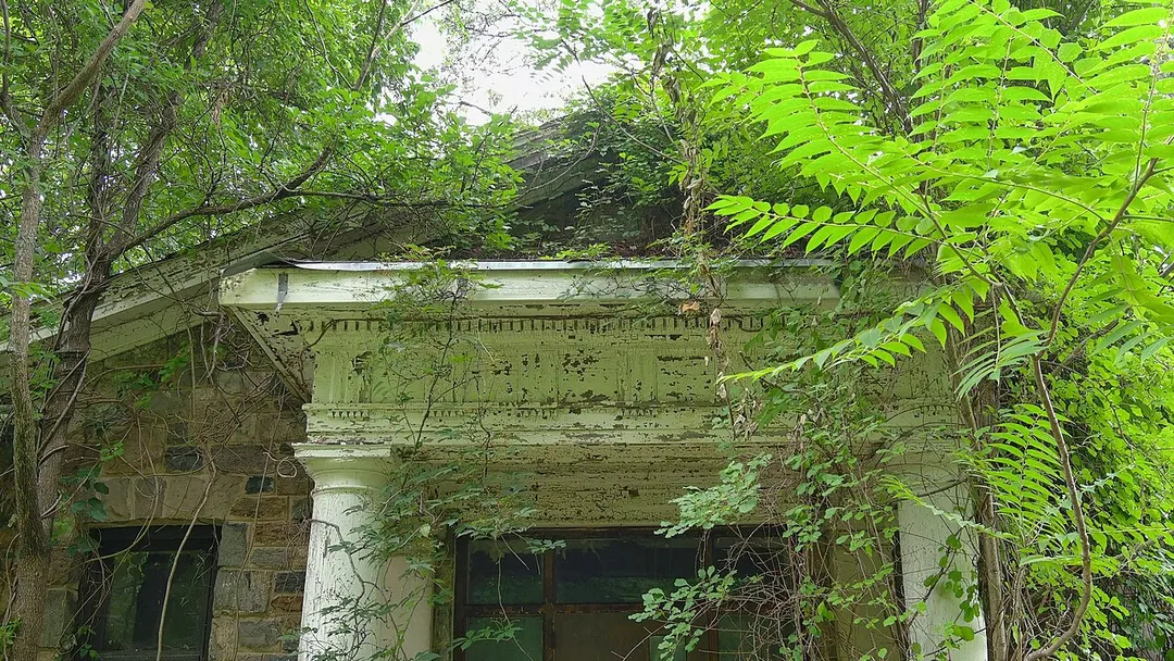 This was Women's Dormitory Building E at Letchworth Village until the facility closed in 1996. It is now abandoned and deteriorating. This picture was taken on August 20, 2021.