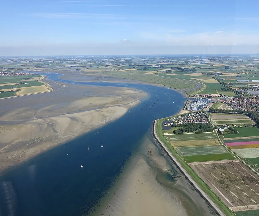 Aerial view of Krabbenkreek in Zeeland. The view is facing east. The town of Sint-Annaland is visible in the right of the photo, while the town of Sint Philipsland is in the top-left.