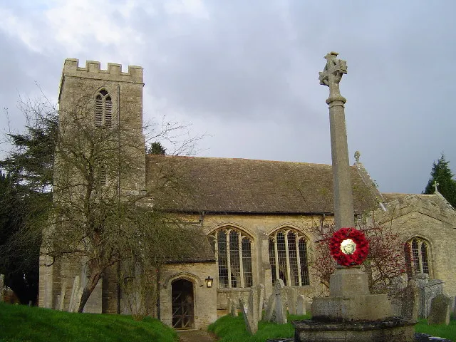 St Andrew's parish church, Thornhaugh, Soke of Peterborough, seen from the south, with the parish war memorial on the right