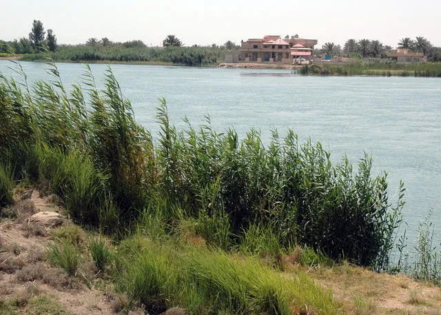 The Tigris River flows in front of a residence north of Tiktr, Iraq (IRQ). (Released to Public) 
Location: Tikrit IRAQ (IRQ)

DoD photo by: JIM GORDON, CIV, USACE  Date Shot: 21 Jul 2005