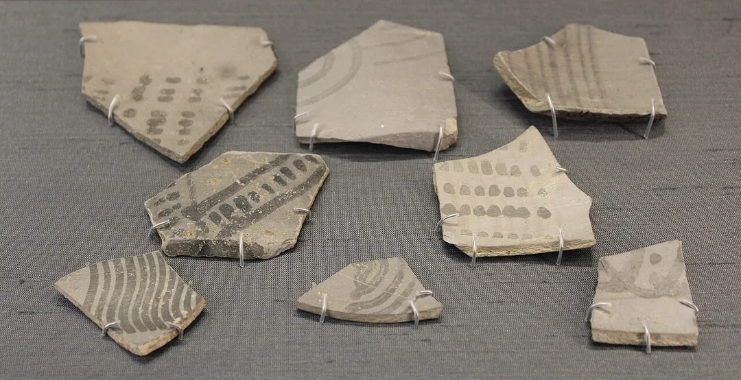Fragments of Painted Grey Ware (PGW), about 1000 BC: black painted geometric decoration on light grey pottery. From Hashtinapura and Radhakund, Uttar Pradesh, and Panipat and Tilpat, Haryana. 1986.1018.2000-2007. British Museum.