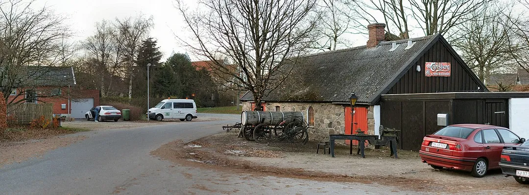Photo of the old part of the village of Tilst, Århus, Denmark, with a forge which has been changed into a pub.