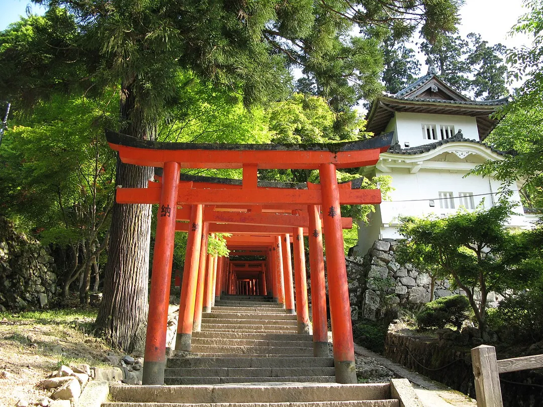 Red tori gates leading up to Inari Shrine