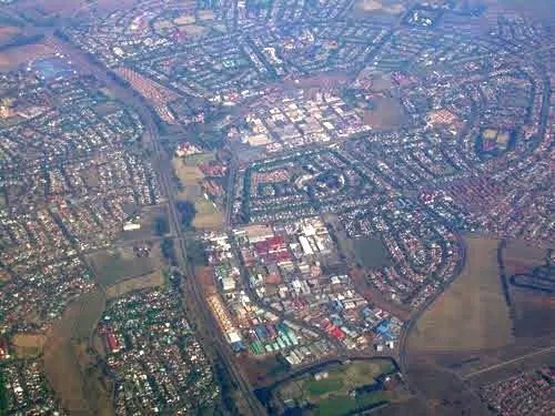 Northern section of Vanderbijlpark from the air. Vanderbijlpark CC forms the central business district, with Barrage Rd clearly visible at left.