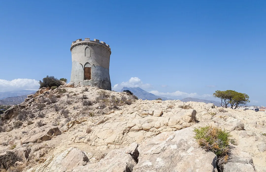 The Torreón Malladeta (Malladeta Keep) is a keep located over Paradise beach in Villajoyosa, in the coast the province of Alicante, Valencian Community (Spain). The keep has an oval-shaped base and was built by a rich family (Esquerdo) at the end of the 19th century inspired by the coastal keeps of the 16th century.




This is a photo of a building listed in the Valencian heritage register as Bé de Rellevància Local (BRL) under the reference 03.31.139-040.