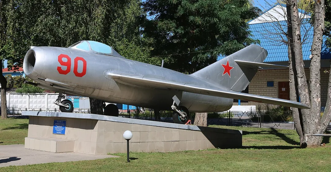 Old Soviet jet fighter MiG-15. Ukrainian Air Force Museum in Vinnytsia. This MiG-15 was erected in honor of three times hero of Soviet Union Chief Marshal of Aviation Ivan Kozhedub on the occasion of the 90th anniversary of his birthday on June, 8 2010.