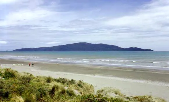 Kapiti Island seen from Waikanae Beach, New Zealand. Photograph taken in February 2000 by James Dignan.