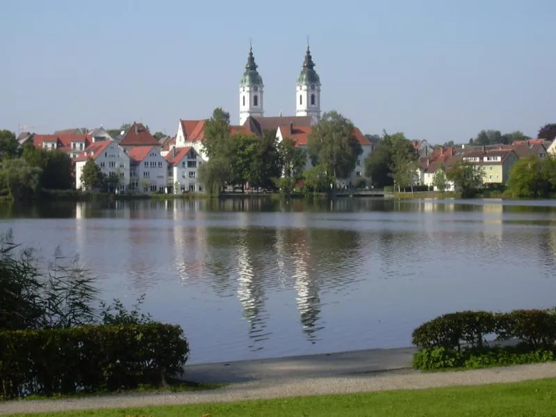 Lake in Bad Waldsee, Germany, with St. Peter's church in the background