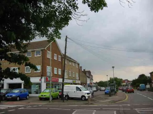 Car showrooms and shops,Welham Green. The road is a dead end leading to a nature reserve.