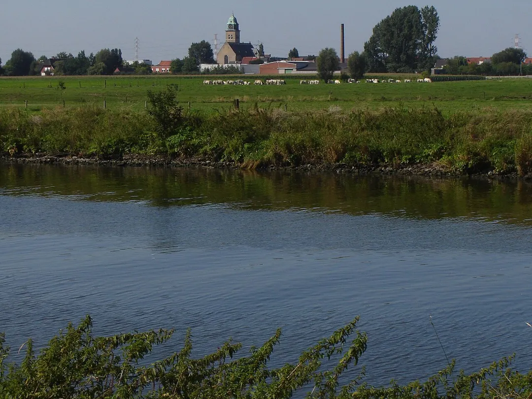 Sint-Theresiakerk and western district of Wevelgem. Wevelgem, West-Flanders, BelgiumPicture taken from across the Leie river