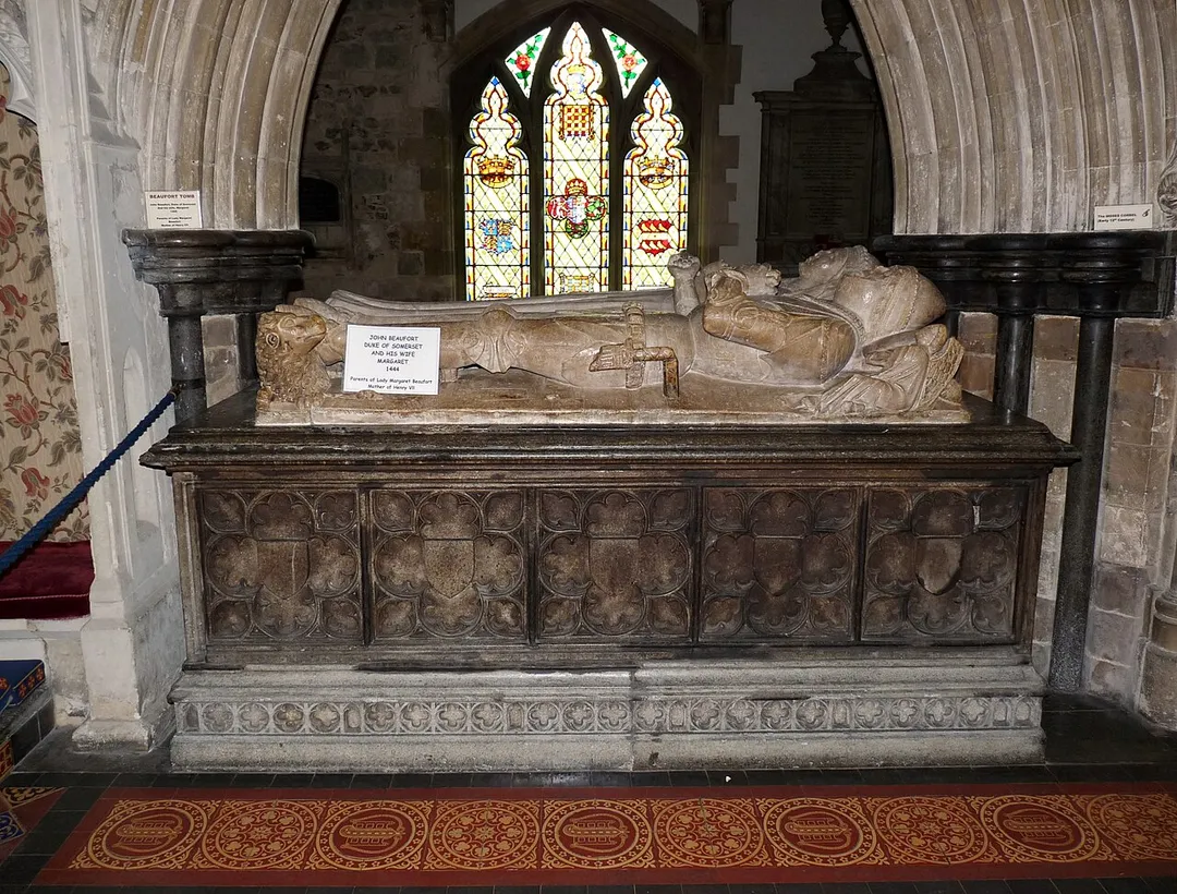 Tomb of John Beaufort, 1st Duke of Somerset and his wife Margaret, in Wimborne Minster, Dorset. He married Margaret Beauchamp (c. 1410 – before 3 June 1482) daughter of Sir John Beauchamp, de jure 3rd Baron Beauchamp of Bletsoe, and his second wife, Edith Stourton. Arms of Beauchamp of Bletsoe: Gules, a fess between six martlets or.