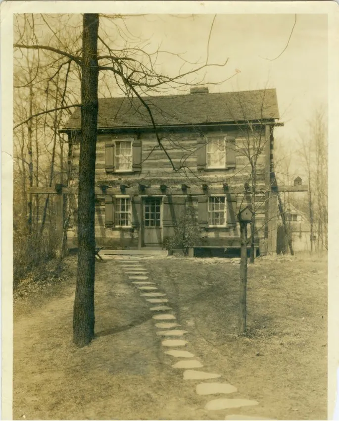 Schmidt-Burnham Log House at its second location on Tower Road.