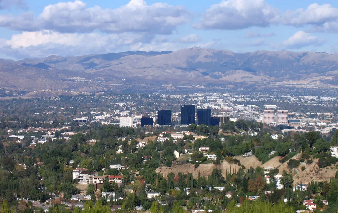 View of the San Fernando Valley, with Woodland Hills and Warner Center in the foreground - viewed from 'Top of Topanga' park area in the Santa Monica Mountains.
The Santa Susana Mountains are visible in the background across the valley.