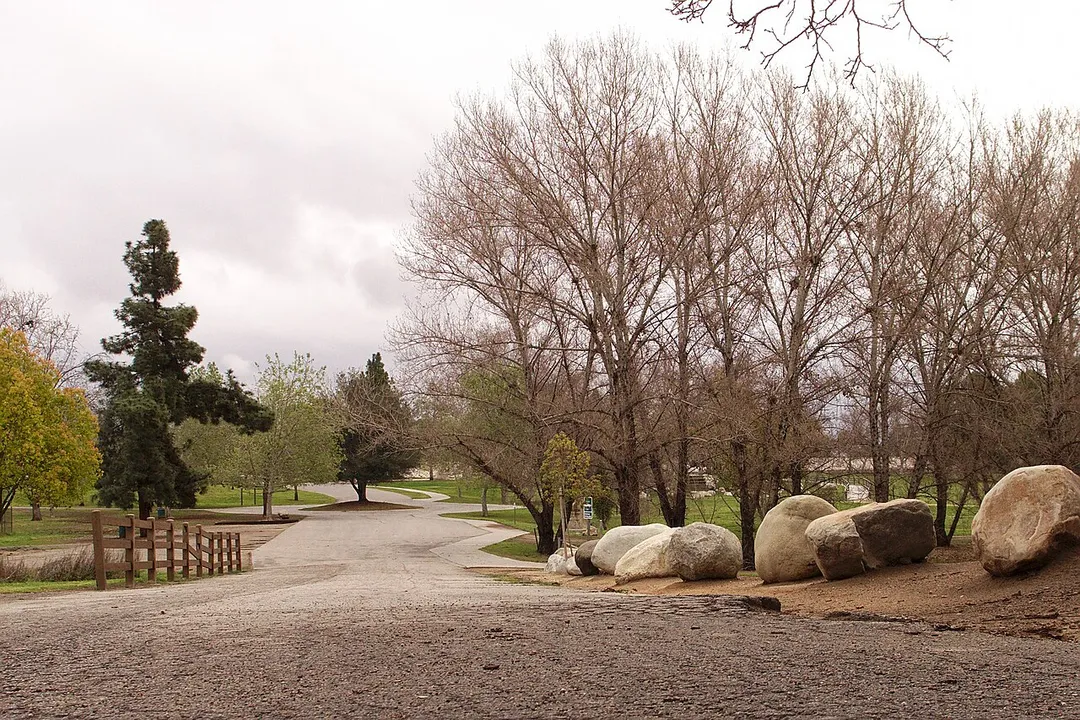 Access road leading to parking areas in Woodley Park, part of the Sepulveda Basin Recreation Area in Van Nuys, Los Angeles, California.