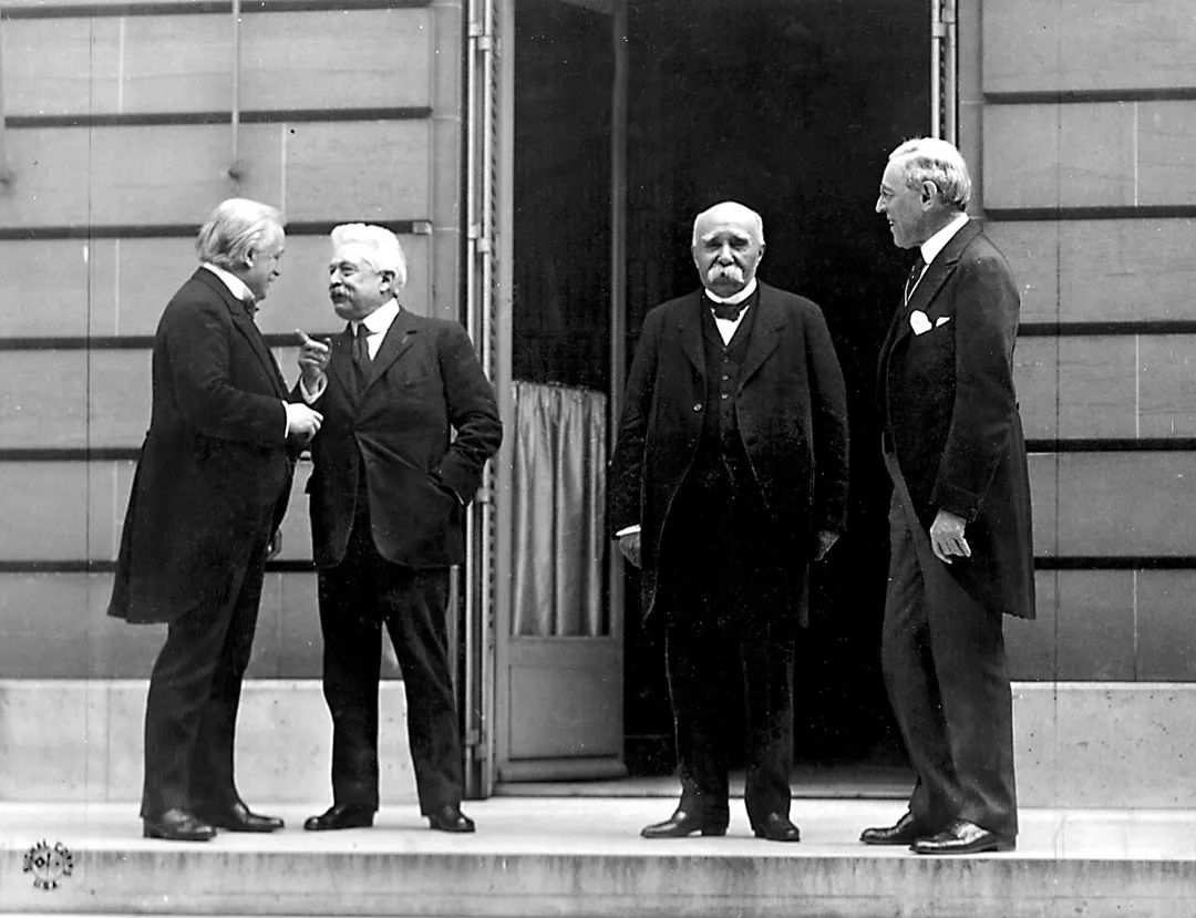 Council of Four at the WWI Paris peace conference, May 27, 1919 (candid photo) (L - R) Prime Minister David Lloyd George (Great Britain), Prime Minister Vittorio Emanuele Orlando (Italy), Premier Georges Clemenceau (France), President Woodrow Wilson (USA)
