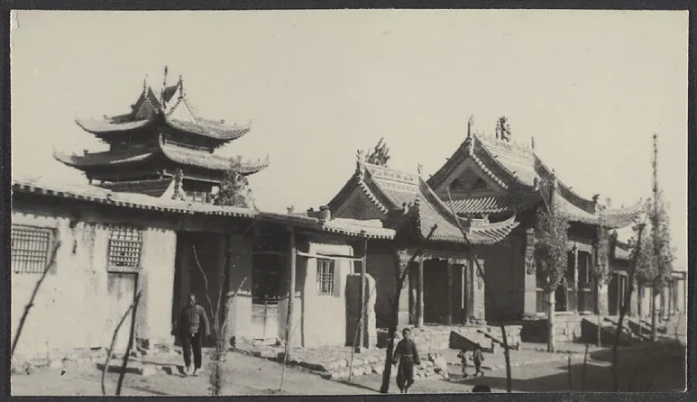 "The entrance and minaret of the Weichow mosque. In this city of ten thousand this one mosque ministers to all branches of Islam and shows a united front that even the Communist army of 1936 could not shake. This mosque is one of the most beautiful in all China." 
General note: Excerpt from unpublished photo essay, plate 42: 

Historical Photographs of China album reference: Hv47. Rev. Claude L. Pickens, Jr.'s trip to northwest China, part 2.