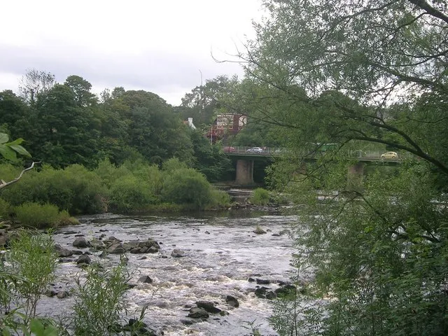 en:Wylam Bridge, showing the railway signal box from the north side of the river Tyne. The bridge is currently under threat of demolition. This will cut the village of Wylam, Tyne &amp; Wear, in two and also take away part of a popular walking route.