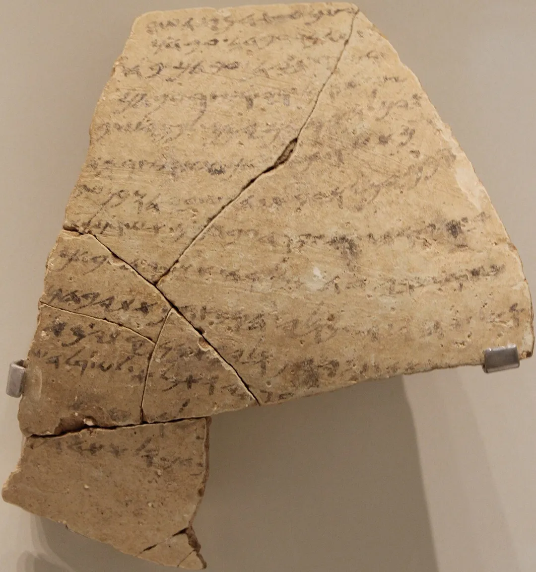 The Yavne-Yam ostracon, also known as the Mesad Hashavyahu ostracon, is an ostracon containing a written appeal by a field worker to the fortress's governor regarding the confiscation of his cloak, which the writer considers to have been unjust. The artefact was found in 1960 by Joseph Naveh at Mesad Hashavyahu, near Yavne-Yam. The inscription is known as KAI 200. The picture was taken in Israel Museum.